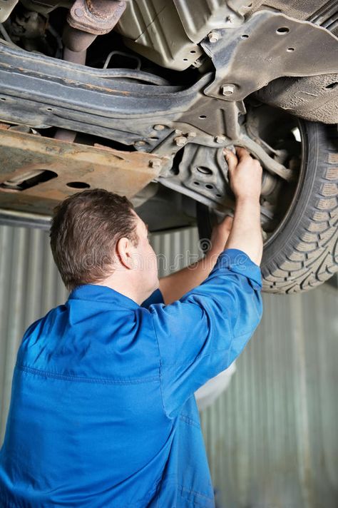 Auto mechanic at car suspension repair work. Car mechanic examining car suspensi , #SPONSORED, #suspension, #repair, #work, #Auto, #mechanic #ad Auto Body Repair Shops, Car Suspension, Graphic Design Portfolio Cover, Rv Repair, Auto Mechanic, Collision Repair, Truck Repair, Auto Body Repair, Bergen County