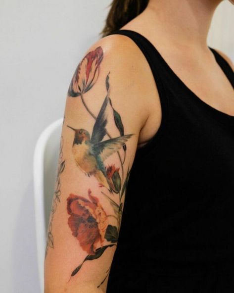 Flowers With A Hummingbird Tattoo Hummingbird Tattoo Ideas, Bird Tattoo Sleeves, Unique Half Sleeve Tattoos, Watercolor Bird Tattoo, Vintage Style Tattoos, Poppies Tattoo, Crow Tattoo, Tattoos For Women Half Sleeve, Upper Arm Tattoos