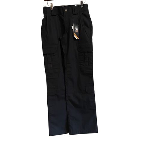 These 511 Tactical Pants In Taclite Cargo Design Are Perfect For Those Who Need Durable And Functional Clothing. With A Solid Blue Color And A Flat Front, These Pants Feature A Zipper Closure And Belt Loops For A Comfortable Fit. The Pants Are Made Of Polyester Material And Have A Canvas Fabric Type, Making Them Stretchy And Comfortable For All Seasons. The Cargo Pockets Provide Ample Storage Space For Your Essentials, And The Pants Come In A Size 4 For A Relaxed Fit. The Pants Are Machine Washable And Have No Distressing, Making Them A Great Choice For Workwear Or Outdoor Activities. The Pants Have A Straight Leg Style And A Mid-Rise, And The Fabric Wash Is Dark. The 5.11 Tactical Brand En 511 Tactical Pants, Functional Clothing, Tactical Pants, Canvas Size, New Color, Pant Jumpsuit, Work Wear, Comfort Fit, Straight Leg