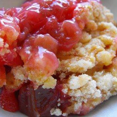 Rhubarb Dump Cake.....really more like strawberry rhubarb crisp. I think I will try instead putting strawberries and rhubarb in the bottom, skipping the jello, and then topping with the cake mix and water as the recipe says? Dot with butter? Rhubarb Dump Cake, Rhubarb Dump Cakes, Coconut Dessert, Rhubarb Desserts, Rhubarb Crisp, Rhubarb Cake, Dessert Aux Fruits, Rhubarb Recipes, Dump Cake Recipes