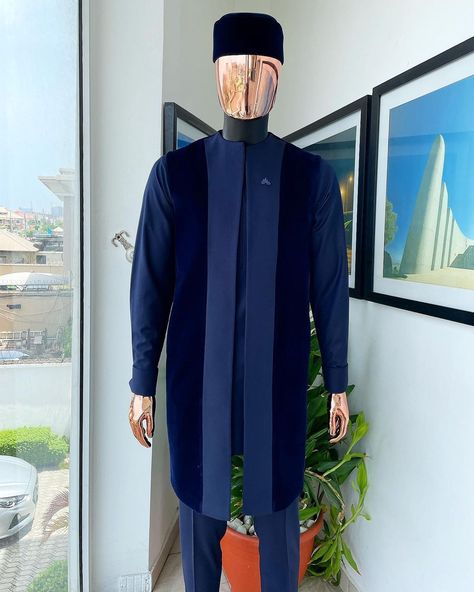 A midnight blue long sleeve kaftan, matching soaked Italian velvet kimono jacket, hat and sokoto African traditional senator kaftan native. What you get: Kaftan men’s top Pant trousers Kimono top Available in any color. Price: available on website To order: iMessage, Text or WhatsApp : +2348179435662 +2348179435663 Email: info@dejiandkola.com Website: dejiandkola.com Male Native Wears, Kimono Jacket Outfit, Kaftan Styles For Men, Mens Kimono Shirt, Imessage Text, Kaftan For Men, Men Kaftan, Dashiki For Men, Prom Suits For Men