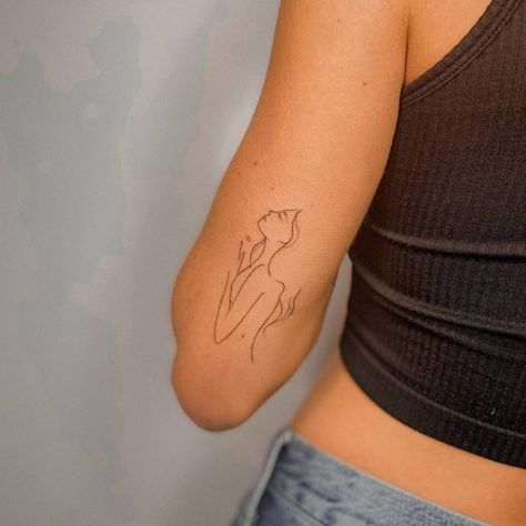 Tattoo Women Silhouette, Single Line Woman Tattoo, Back Of Tricep Tattoos Women, Women Silhouette Tattoo, Woman Silhouette Tattoo, Small Hip Tattoos Women, Tricep Tattoos, Indian Feather Tattoos, Rihanna Cover