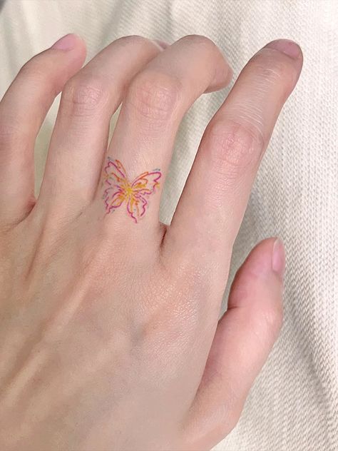 Cute Tattoo Butterfly, Pixie Butterfly Tattoo, Korean Tattoo Style, Subtle Kpop Tattoos, Butterfly Aesthetic Tattoo, Finger Butterfly Tattoo, Pressed Penny Tattoo, Dainty Butterfly Tattoos, Cute Back Tattoos For Women