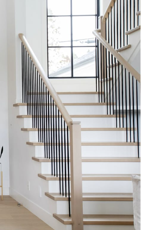 Switch Back Stairs, White Oak Stairs Black Railing, White Oak And Iron Staircase, Updated Staircase Spindles, Metal Spindles Staircase, Oak Staircase With White Spindles, Staircase Windows, Metal Stair Spindles Farmhouse, Scandinavian Staircase