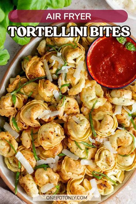 Perfect for a crunchy snack or as a simple appetizer, this air fryer tortellini recipe is quick, easy, and oh so tasty! Seasoned cheese-filled tortellini coated in parmesan before air fried until perfectly golden and crunchy, this will be your new favorite air fryer recipe. Easy Tortellini Appetizers, Cheese Tortellini Air Fryer, Fried Tortellini Air Fryer, Fried Tortellini Recipes, Tortellini Bites Appetizers, Half Fried Tortellini, Tortellini Appetizer Recipes, Air Fried Tortellini, Air Fryer Stuffed Shells