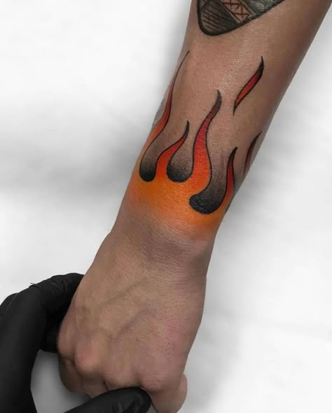 Flame Wrist Tattoo, Blue Flame Tattoo, Ok Tattoo, Arrow Tattoo On Wrist, Tattoos On Wrist, Modern Tattoo Ideas, Flame Tattoo, Red Tattoo Ideas, Wrist Tattoo Ideas