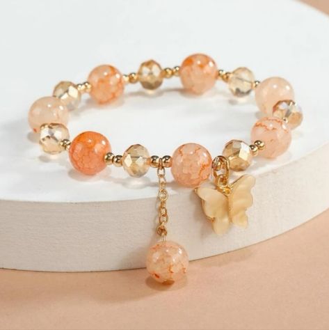 Beaded Butterfly Charm Bracelet Material: Glass, Alloy, Diy Charm Bracelet Ideas, Glass Beads Bracelet Ideas, Pretty Beaded Bracelets, Glass Bead Bracelet Ideas, Charm Bracelet Ideas, Glass Bead Jewelry Diy, Peach Butterfly, Peach Bracelet, Charm Beaded Bracelet