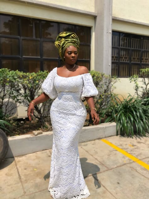 Nigerian White Lace Long Gown Styles, Free White Lace Gown Styles Nigerian, White Lace Free Gown Styles Nigerian, White Lace Gown Styles Nigerian, White Lace Dress Styles Nigerian, Lace Dress Styles Nigerian, Lace Gown Styles Nigerian, Ghanaian White Wedding Gowns, White Asoebi Lace Styles Classy 2022