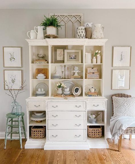 Beautiful stylings with a hint of spring for your viewing pleasure! This feature wall decor style is simply amazing, so inspiring, right?⁠ We Spy an AFH WINDOW WALL DECOR⁠ in this gorgeous display too! #homedecor #walldecor Hutch Decorating Ideas Farmhouse, Living Room Hutch Decorating Ideas, Hutch In Living Room, Farmhouse Hutch Decor, Hutch Decorating Ideas, Living Room Hutch, White Farmhouse Table, White Hutch, Hutch Ideas