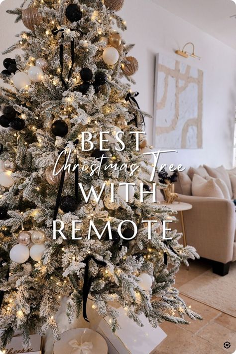 flocked Christmas tree on sale. it comes with a storage bag and remote with timer 😍 Follow me in the @LTK shopping app to shop this post and get my exclusive app-only-content! #liketkit #LTKHoliday #LTKSeasonal #LTKhome @shop.ltk Flocked Tree Inspiration, Flocked Modern Christmas Tree, Black And White Flocked Christmas Tree Decor, Christmas Tree Frosted Decorating Ideas, Flocked Black Christmas Tree, Flocked Pine Christmas Tree Decorated, Black White Beige Christmas Tree, Flocked Christmas Tree Gold Ornaments, Christmas Tree Decor Ideas Neutral