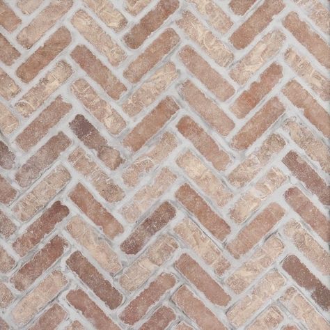 White herringbone tile floor