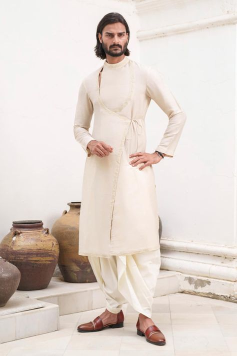 Buy Beige Chanderi Embroidery Bloom Vine Border Angarkha Kurta With Dhoti For Men by Amrit Dawani Online at Aza Fashions. Ivory Kurta For Men, Angharka Style Kurti, Angharka Style, Punjabi Kurta Pajama Men, Angarakha Kurta, Angrakha Style Kurti, Dhoti For Men, Kurta Designs Men's, Kurta With Dhoti