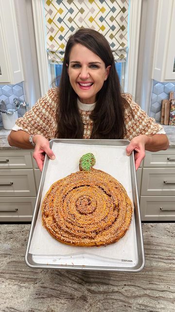 Maegan Brown ~ The BakerMama on Instagram: "GIANT PUMPKIN CINNAMON ROLL 😍🎃😋 Drizzled with pumpkin spice icing and topped with sprinkles, it’s the best way to enjoy a cozy fall morning! HOW-TO BELOW ⬇️ #TheBakerMama

Ingredients:
2 (17.5 ounce) cans Grands! Pumpkin Spice Cinnamon Rolls (10 rolls total)
Pumpkin Spice Icing, from the cinnamon roll cans
Orange sprinkles
Green sprinkles

Instructions:
1. Preheat the oven to 350°F. Line a large sheet pan with parchment paper.
2. Place a cinnamon roll in the center of the pan. Then, working outwards, carefully unravel each of the remaining cinnamon rolls and wrap it around the center cinnamon roll to create a large round spiral of cinnamon rolls. 
3. Shape the end of the last cinnamon roll to create the stem on top by folding the last few inch Pumpkin Spice Cinnamon Rolls, Kids Halloween Party Food, Cinnamon Roll Dough, It's The Great Pumpkin, Pumpkin Uses, Giant Pumpkin, Spooky Stuff, Quick Dinners, Bowtie Pasta