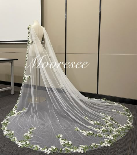 Veil with comb: https://www.etsy.com/listing/1465315143/outdoor-embroidery-daisy-and-green-leaf?click_key=31a7e2d62fcc6f2eca8f58395cfade4f8f00bce6%3A1465315143&click_sum=26a0e42a&ga_search_query=Daisy&ref=shop_items_search_2&pro=1&frs=1&sts=1 Daisy dress: https://www.etsy.com/listing/1448108537/custom-beauty-daisy-flower-light-green?click_key=971a79aa732fa40f7258a68688ff2b4db60dddc6%3A1448108537&click_sum=efca6356&ga_search_query=Daisy&ref=shop_items_search_3&pro=1&frs=1&sts=1 Give us a chance,we will give you a satisfactory product! Please contact customer service for custom length prices thank you Material:  Tulle&Lace Applique Pic color:Ivory tulle Pic Length:Church 98'' Accept Custom Orders Beauty Veil make your wedding perfect! Shipping and processing time 7-10 Days+ I will check care Irish Wedding Veil, White And Green Wedding Veil, Veil With Leaves, Garden Wedding Veil, Veil With Green Embroidery, Sage Green Wedding Veil, Detailed Wedding Veil, Nature Wedding Veil, Sage Green And White Wedding Dress