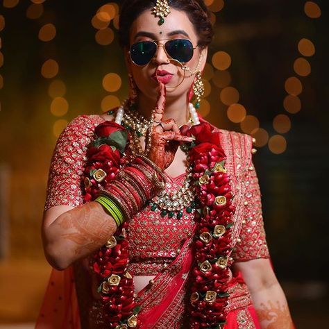 Image may contain: 1 person, sunglasses Parul Garg Makeup, Bride Swag, Parul Garg, Bridal Sunglasses, Bride Sunglasses, Bride Photography Poses, Indian Wedding Photographer, Bride Book, Bride Photography