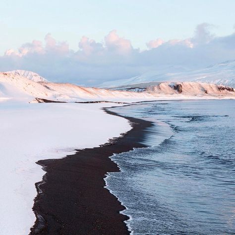 Photo by Corey Arnold @arni_coraldo  Fresh snow meets the Bering Sea on the black sand beaches of Atka Island, way out west on the Aleutian Island chain in Alaska. Currently out exploring the Aleutians... soon crabbing in the Bering Sea. follow along at @arni_coraldo #atka #aleutians #aleutiandream #blacksand #volcano #beringsea #winter #beach #photooftheday Heat Lightning, Alaska National Parks, Black Sand Beaches, Aleutian Islands, Bering Sea, Kenai Fjords National Park, Visit Alaska, Glacier Bay National Park, Kenai Fjords