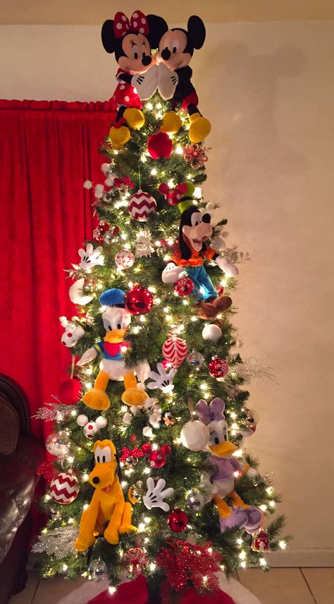 Disney Christmas tree Mickey Mouse Disney Ornaments Christmas Tree, Mikey Mouse Christmas Decorations, Disney Themed Christmas Trees Mickey Mouse, Christmas Tree Ideas Mickey Mouse, Mickey And Friends Christmas Tree, Mickey And Minnie Christmas Tree Ideas, Diy Disney Christmas Decorations Outdoor, Mickey And Minnie Mouse Christmas Tree, Christmas Disney Tree