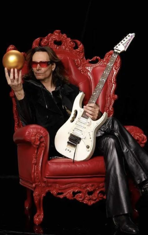 Steve Vai during an interview holding his signature guitar Steve Vai Guitar, Guitar Poses, Famous Guitars, Ibanez Guitars, Signature Guitar, Steve Vai, Guitar Players, Floyd Rose, Guitar Pickups