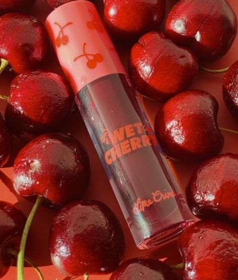 The dripping wet reflection of a maraschino cherry in a lip gloss infused with nourishing Vitamin E and a sugary sweet scent! Shop the Wet Cherry Lip Gloss collection this week during our BOGO Lip Sale 🔗Link in bio Shown: Diet Cherry #wetcherry #lipgloss #viralmakeup Cherry Lip Balm Aesthetic, Cherry Lip Gloss Aesthetic, Cherry Lip Gloss, Cherry Lipgloss, Cherry Coke Lip Gloss, Cherry Makeup Products, Cherry Red Lip Gloss, Cherry Scented Products, Black Cherry Lipgloss