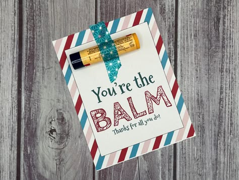 "This is a printable file.  No actual items will be shipped.  Looking for something creative as an appreciation gift?   Add chapstick or lip balm to this tag for something unique!  This listing includes the sentiment, \"You're the Balm.  Thanks for all you do!\"  You will receive one pdf file that includes 4 of the same design per page.  Print these tags on sturdy cardstock and cut them apart for the perfect addition to your chapstick! Attach the chapstick using washi tape or attach it with ribb Chapstick Valentine, Chapstick Gift, You're The Balm, Chapstick Lip Balm, Punny Valentines, Appreciation Gifts Diy, Staff Appreciation Gifts, Teacher Appreciation Gifts Diy, Something Creative