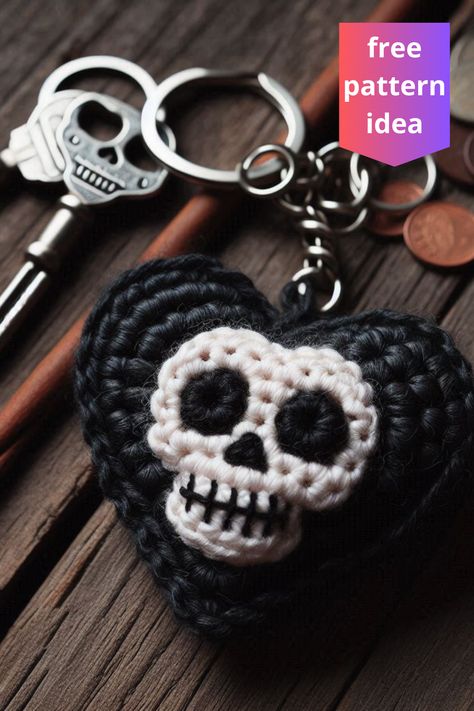 Create a spooky crochet skull heart keychain with this simple pattern! Perfect for adding a gothic touch to your accessories in no time. Crochet Patterns Skeleton, Crochet Skull Keychain Free Pattern, Crochet Skull Bookmark, No Sew Crochet Keychain Patterns, Crochet Pattern Key, Crochet Funny Keychain, Crochet Patterns Skull, Tiny Crochet Keychain, Crochet Tombstone Pattern