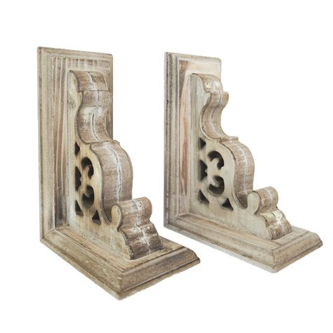 "Buy the American Art Décor™ 8\" Vintage Decorative Wood Bookends, 2ct. at Michaels. com. Painted in distressed vintage infused detailing, these pieces will fit seamlessly into a farmhouse, traditional, classic, grand millennial, and French Country style decors. This set of two Renaissance-inspired carved wood bookends come evenly weighted to hold up and organize your favorite classic hardbacks or important paperwork. Painted in distressed vintage infused detailing, these pieces will fit seamles Shabby Chic Farmhouse Decor, Chic Farmhouse Decor, Wood Bookends, Decorative Bookends, Grand Millennial, Farmhouse Traditional, Shelf Table, Country Style Decor, Wood Corbels