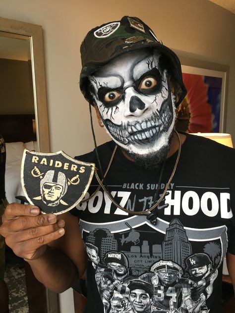 Super fan face paint by artist at MakingFacesMN. Raiders Face Paint, Fan Face Paint, Football Face Paint, Bar Stuff, Painted Fan, Lotus Pond, Los Angeles City, Raider Nation, Face Painting Halloween