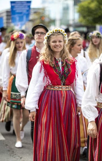 Estonian People in Traditional Clothing Walking the Streets of Tallinn Editorial Stock Image - Image of capital, ethnic: 152758354 Estonian Clothing, Female Songs, Tallinn Estonia, National Clothes, Walking Outfits, Walking Street, Women Street, Tallinn, Formal Attire