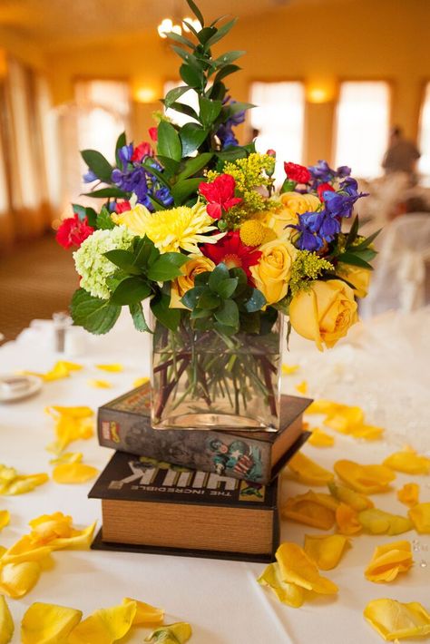 Marvel Wedding Theme, Superhero Wedding Theme, Book Centerpiece, Comic Wedding, Yellow Wedding Decorations, Marvel Wedding, Comic Book Wedding, Elegant Wedding Ideas, Book Centerpieces