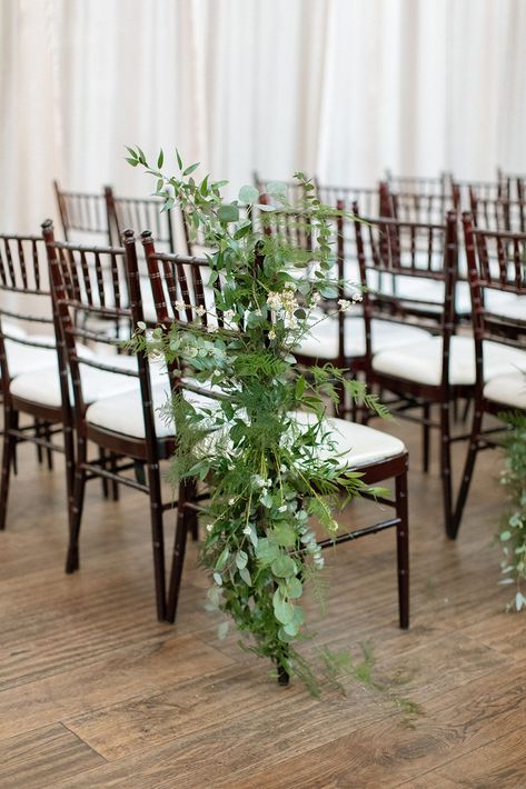 Ceremony aisle chairs have a large cluster of greenery attached to them for an easy way to add more fresh floral to the wedding ceremony. Candles Ceremony, Floral Table Centerpieces, Candle Lit Reception, Spring Time Wedding, Pew Flowers, Wedding Ceremony Aisle, Ceremony Candles, Beautiful Bridal Bouquet, Ceremony Aisle