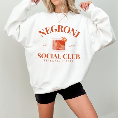 Negroni Social Club Crewneck Sweatshirt | Firenze Italia Italian Cocktail Aperitivo Pullover Sweater | Gift for Her, Him, Trendy Graphic Top by OutOfOfficeAttire on Etsy Outfits Vintage Retro, Colorado Girl, Trendy Crewneck, Ski Club, Retro Ski, Bachelorette Outfits, Trip Outfits, Club Sweatshirts, Preppy Aesthetic