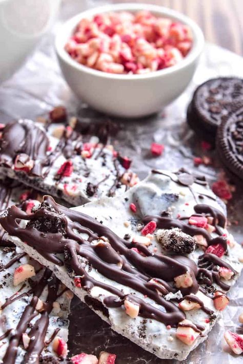 Oreo Peppermint Bark is one of our holiday favorites! Creamy white chocolate loaded with crushed Oreos and peppermint pieces, then topped with crunchy Oreos and a drizzle of milk chocolate. This bark is easy to make and SO addictive....and it makes the best holiday gift! Peppermint Oreo Bark, Oreo Bark Christmas, Oreo Peppermint Bark, Lemon Tree Dwelling, Peppermint Bark Recipes, Bark Recipes, Christmas Bark, Peppermint Recipes, Christmas Peppermint