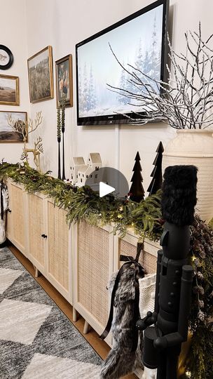 3K views · 588 reactions | Here’s a look at how I decorated my console table last Year! Comment “shop” below, and I will DM you the links that are available this year, or click the link in my bio to shop! Save this post for future inspiration, and check out my stories for more. ✨
.
.
.
 #holiday #holidaydecor #christmasdecorating #manteldecor #consoletabledecor 
#christmasinspo #christmashomedecor #christmas  #consoletable #consoletablestyling #tvstand #tvconsole #christmasdecor #christmasgarland #garland | Esperanza Maldonado || Home Decor || DIY || Latina Christmas Tv Console Decor, Tv Console Christmas Decor, Tv Console Styling, Console Table Christmas Decor, Christmas Console Table Decor, Tv Stand Christmas Decor, Tv Console Decor, Future Inspiration, Christmas Decorations Apartment