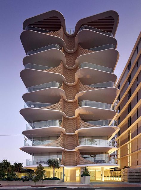 This sculptural and eye-catching building has organic, overlapping architectural curves that resemble the nearby heritage-listed Norfolk Pine Trees. Koichi Takada, Color Exploration, Thesis Ideas, Norfolk Pine, Urban Housing, Passive Solar Design, Timber Roof, Residential Building Design, Burleigh Heads