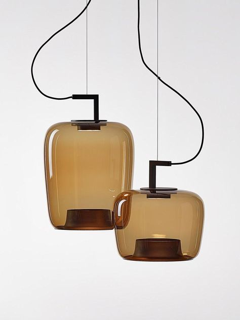 The Doppelte Pendant Lamp is an elegant lighting solution that combines glass and lightweight aluminum elements for a unique and harmonious form. Diffused light and shadows pass through the metal rings and glass spheres at the bottom, crafted by glass masters and carefully inspected prior to blowing. The steel wire suspension adds to the portability, and LED light sources are diffused through a softener. Available in 3 different shapes, the Doppelte lamp is perfect for private interiors and large compositions. 
 
 
 
 
 
 
 
 
 
 
 
 If you have any questions about our products, please contact us and we will reply to you within 24 hours. 
 Product Size 
 Model A Size: Dia 44cm x H 30.5cm /  17.3 x H 12  
 
 Model B Size: Dia 35cm x H 36.5cm /  13.8 x H 14.4 
 
 Model C Size: Dia 36cm x H 5 Aluminum Element, Elegant Lighting, Diffused Light, Different Shapes, Light And Shadow, Lighting Solutions, Metal Rings, Warm Light, Led Lamp