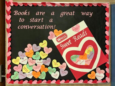 Conversation Hearts Library Bulletin Board for Valentine’s Day. Each heart is an appropriate book title from our collection. The candy box is standard poster board with red paper, 11x17 transparency for the window. Thanks to Cricut for their cutter helping with the lettering. Love Your Library Bulletin Board, Read A Thon Fundraiser Bulletin Boards, Library Conversation Hearts, I Love To Read Month Door Decorations, February Bulletin Board Ideas High School, Candy Hearts Bulletin Board, Read Your Heart Out Bulletin Board, Conversation Hearts Bulletin Board, Valentine Bulletin Boards For Library