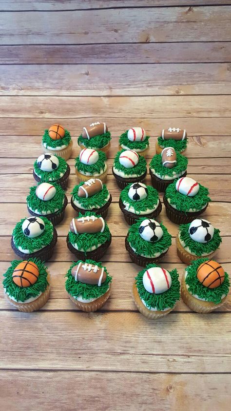 Sports themed cupcakes Sport Cupcakes Ideas, Ball Theme Cupcakes, Sport Themed Cupcakes, Sports Birthday Cupcakes, Sports Cupcake Cake, Sports Cupcakes Ideas Boys, Sports Themed Treats, Sports Theme Cupcakes, Camp Treats