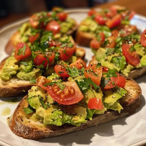 Smashed Avocado Bruschetta: A Delicious and Easy Recipe for Any Occasion Delicious Smashed Avocado Bruschetta, Smashed Avocado Bruschetta, Avocado Bruschetta Recipe, Vegan Bruschetta, Avocado Bruschetta, Healthy Seafood Dishes, Classic Bruschetta, Homemade Bruschetta, Easy To Make Appetizers