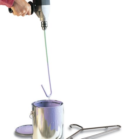 Forget your old stir sticks! Instead, grab a plastic hanger and cut off the bottom rung with a fine-tooth saw, leaving a “stirring hook” on one end. Tighten it in an electric drill and mix paint or finish in seconds. Diy Paint Mixer For Drill, Wallpapering Tips, Paint Brushes And Rollers, Painting Tricks, Mix Paint, Paint Cabinets, Paint Stirrers, Paint Removal, Paint Rollers