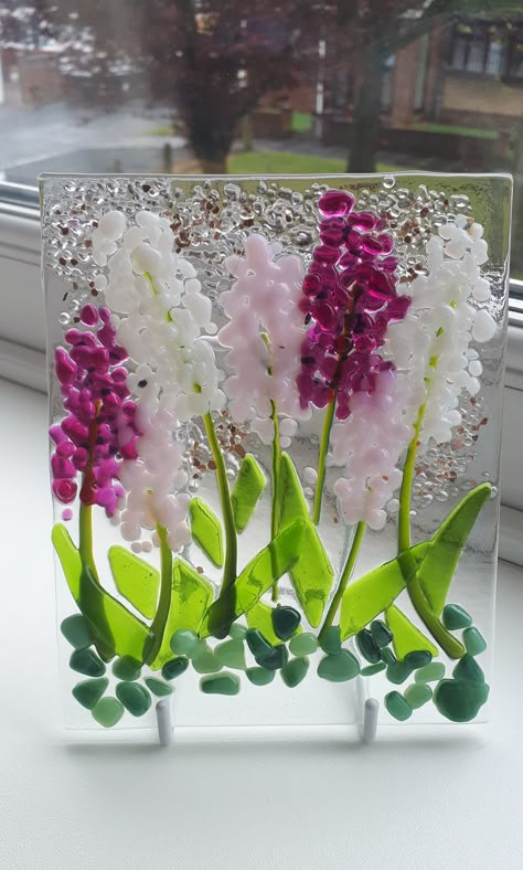 The latest addition to my #etsy shop: Decorative, Plaque, Spring, Flowers, Hyacinths, pastel colours, sold with Display Stand. https://etsy.me/3ejwMcO #pink #green #glass #glassart #fusedglass #decorative #plaque Flower Glass Mosaic, Beginner Fused Glass Ideas, Glass Fusing Ideas Inspiration, Fused Glass Pelican, Glass Fusion Flowers, Infused Glass Ideas, Fused Glass Leaves, Spring Fused Glass Ideas, Fused Glass Coaster