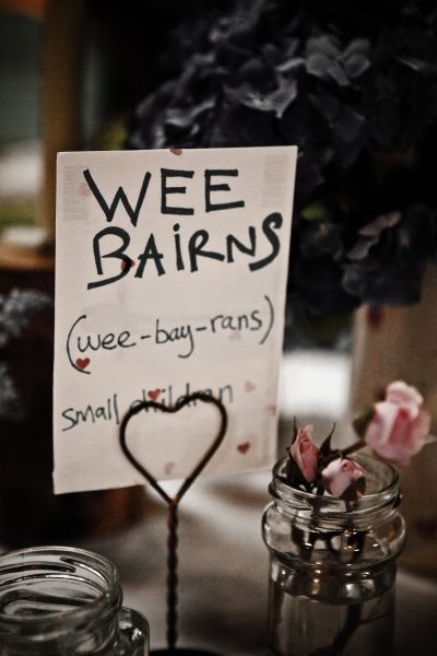 Table names - Scottish words and phrases. Great for a laugh.  This was my youngest daughter's nick name for many years. Scottish Birthday Party, Scottish Party, Scottish Wedding Themes, Scottish Wedding Traditions, Wedding Redo, Scottish Words, Tartan Wedding, Wedding Table Decoration, Highland Wedding