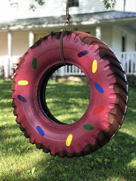 June 5th was National Donut Day, and all the motivation I needed to finally get around to making a donut tire swing like the ones I've seen on Pinterest. Choosing a tire    The first thing I needed to do was find a tire. I was able to pick from a few my neighbor had in a pile and of course chose the heaviest one known to man because I liked the tread pattern. I would recommend using a car rather than tractor tire like I did. That is unless you have a strong back and a team of horses.I… Kids Activities Outdoor, Tyre Planters, Outdoor Backyard Ideas, Diy Kids Activities, Diy Kid Activities, Activities Outdoor, Tire Planters, Donut Day, Porch Swing Bed