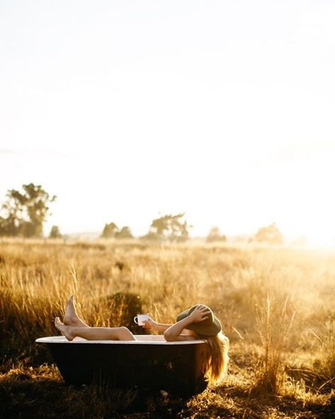 I made @luisabrimble and @the_dailys drag a old bath tub across the paddock to help me live out a childhood dream!! I saw a episode of McLeods daughters when I was a wee lass (it's an Australian TV serious of woman in the outback) and they had a bath in the middle of a open field, and since then it's been a dream of mine to do this.....thanks ladies for being so cooperative..☀️ #photo by @luisabrimble ( no breakfast today... Zzzzz ) Clawfoot Tub Photoshoot, Outdoor Clawfoot Tub Photoshoot, Outdoor Milk Bath Photography, Bathtub Editorial, Mill Bath Maternity Photos, Milk Bath Photography, Bath Photography, Outdoor Tub, Outdoor Baths