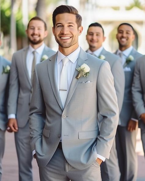 The grey groomsmen suit is a timeless and versatile choice, exuding elegance and sophistication. Its neutral color allows for effortless pairing with various styles and colors, ensuring a polished and refined look. Whether it's a traditional or modern wedding, the grey groomsmen suit is sure to make a stylish statement. Groom White Tie Grey Suit, Light Gray Groomsmen Suits Color Schemes, Grey Suit Wedding Groom & Groomsmen Suits, Dusty Blue Wedding Menswear, Groomsmen Light Grey Suit, Groom And Groomsmen Attire Grey, Grey Wedding Suits, Groomsmen Attire Grey, Grey Groomsmen Suits