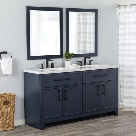 Transform your bathroom with the Potter 60.5-in W deep blue vanity. This double-sink bathroom vanity features a Shaker-style design that’s complemented by a 1-piece white cultured marble sink top and matte black hardware. Pre-assembled and ready to install, this vanity also includes a wraparound drawer with 3 compartments and a 2-door cabinet below each sink for easy-access storage space. This transitional vanity adds style and storage in large and shared bathrooms. Style Selections Potter 60-in Blue Double Sink Bathroom Vanity with White Cultured Marble Top | LW24W60P2-DB Blue Double Sink Bathroom Vanity, Blue Bathroom Vanity With Black Hardware, Navy Vanity With Black Hardware, Bathroom Cabinet Navy, 49 Inch Bathroom Vanity, Navy Blue Cabinets With Black Hardware, Dark Blue Bathroom Vanity Ideas, Navy Blue And Grey Bathroom Ideas, Small Bathroom Double Vanity Ideas