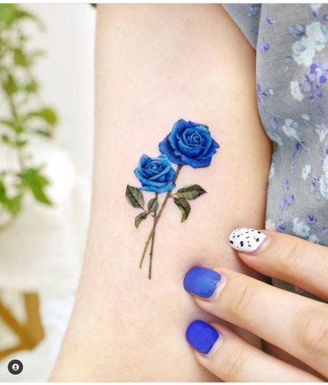 24 Lovely Blue Rose Tattoo Designs - The XO Factor Blue Rose Tattoo Meaning, Blue Flower Tattoos, Blue Ink Tattoos, Single Rose Tattoos, Small Wave Tattoo, Rose Tattoo Meaning, Rose Hand Tattoo, Rose Tattoos For Women, Blue Rose Tattoos