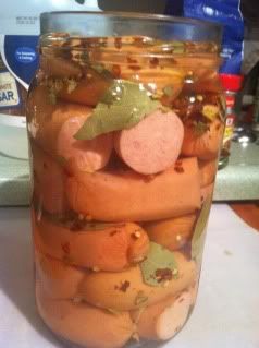 Hot Pickled Bologna Ingredients: 3 lbs. ring bologna or good, non-flavored large, inch or more thick hot dogs/franks/german sausage. 2 tsps. salt 1 (4.5 oz) can chopped pickled jalapenos 1/4 cup... Pickled Weiners Recipes, Pickled Weiners, Pickled Sausage And Jalapenos, Pickled Red Hot Sausages, Spicy Pickled Sausage Recipe, Hot Pickled Bologna Recipe, Pickled Bologna Recipe, Pickled Eggs And Sausage Recipe, Hot Mama Pickled Sausage