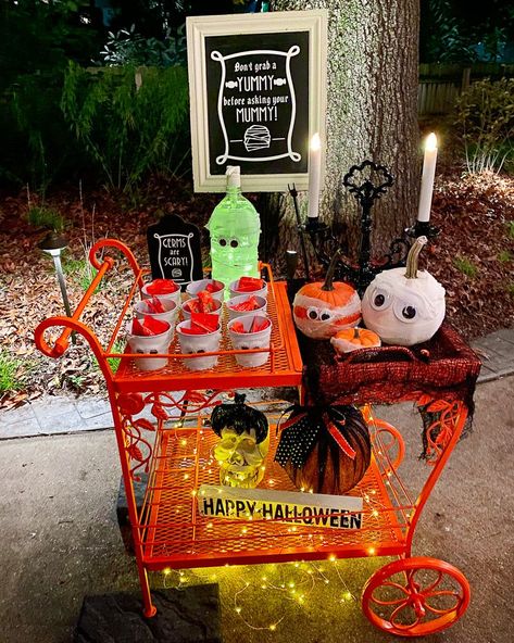 Trick R Treat Birthday Party, Business Trick Or Treat Ideas, Halloween Driveway Candy Table, Driveway Trick Or Treating, Trick Or Treat Driveway Ideas, Halloween Candy Table Trick Or Treat, Adult Trick Or Treat Ideas, Trick Or Treat Table Outside, Trick Or Treat Candy Ideas