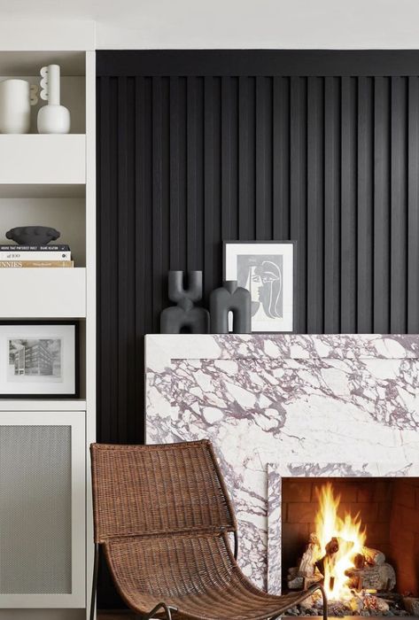 Black Wood Slat Fireplace, Black Fluted Fireplace Wall, Fluted Wood Panel Fireplace, Quartz Fireplace Hearth, Black Slat Wall Fireplace, Black Fluted Fireplace, 2023 Fireplace Ideas, Panel Fireplace Wall, Reeded Fireplace