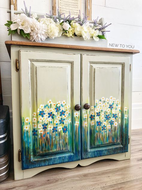 Hand painted flowers on a cabinet Floral Painted Kitchen Cabinets, Hand Painted Cupboards, Hand Painted Cabinets Kitchens, Hand Painted Kitchen Cabinets, Painting On Cupboard, Cupboard Painting Ideas Diy, Flowers On Furniture, Cupboard Painting Ideas, Cupboard Painting